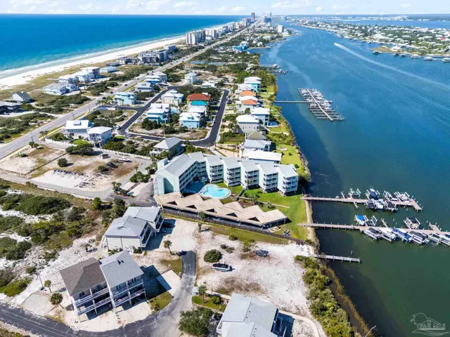 a view of a swimming pool and a yard