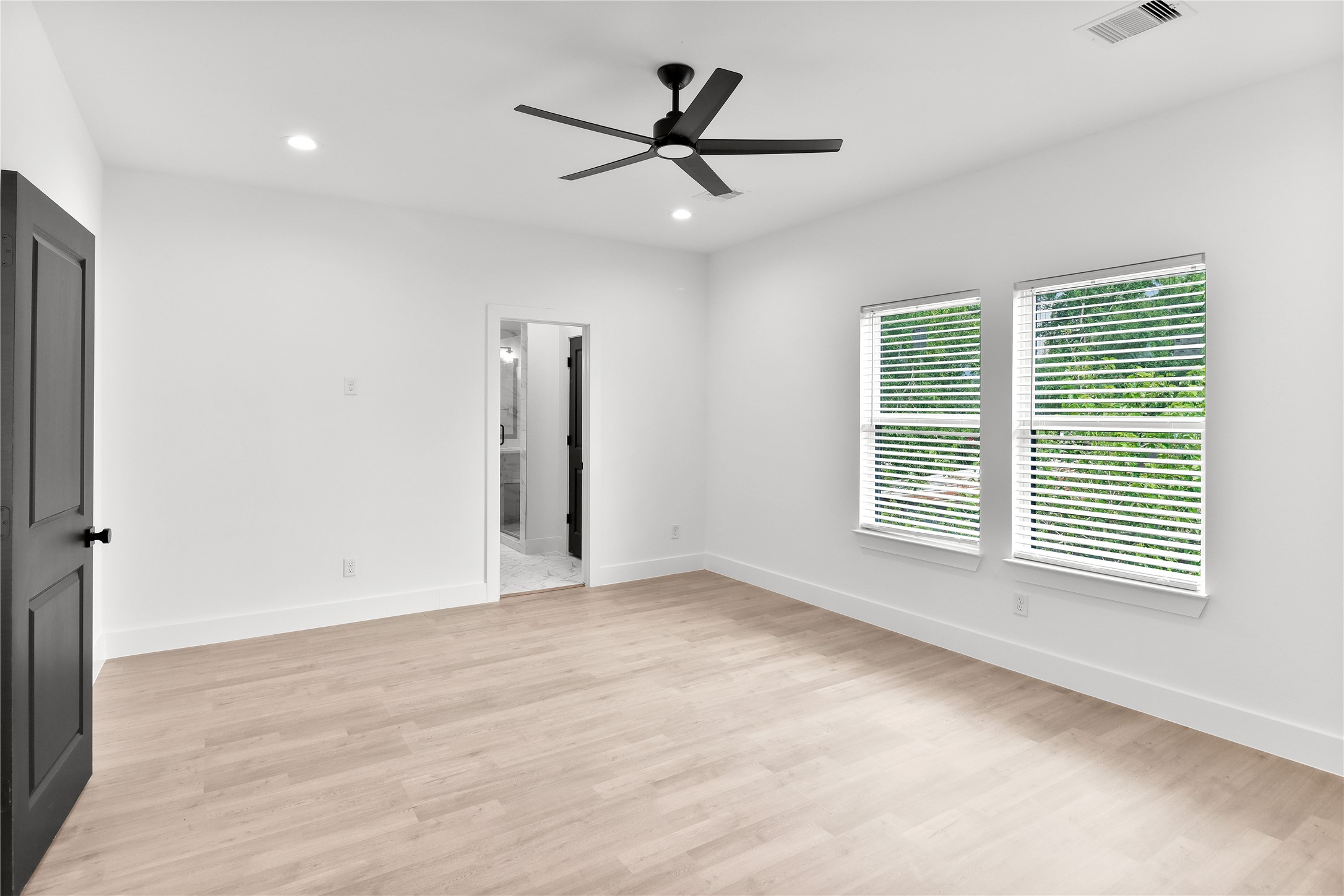 8136 Chateau Street Houston, TX 77028 - Photo 15 of 33 a view of an empty room with a window