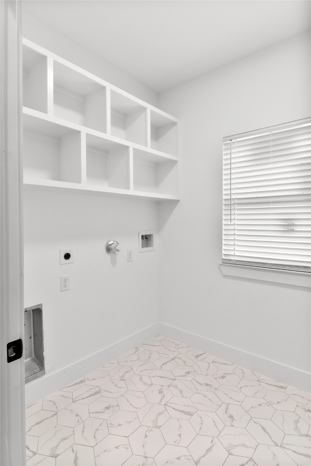 8136 Chateau Street Houston, TX 77028 - Photo 20 of 33 a view of an empty room with a window