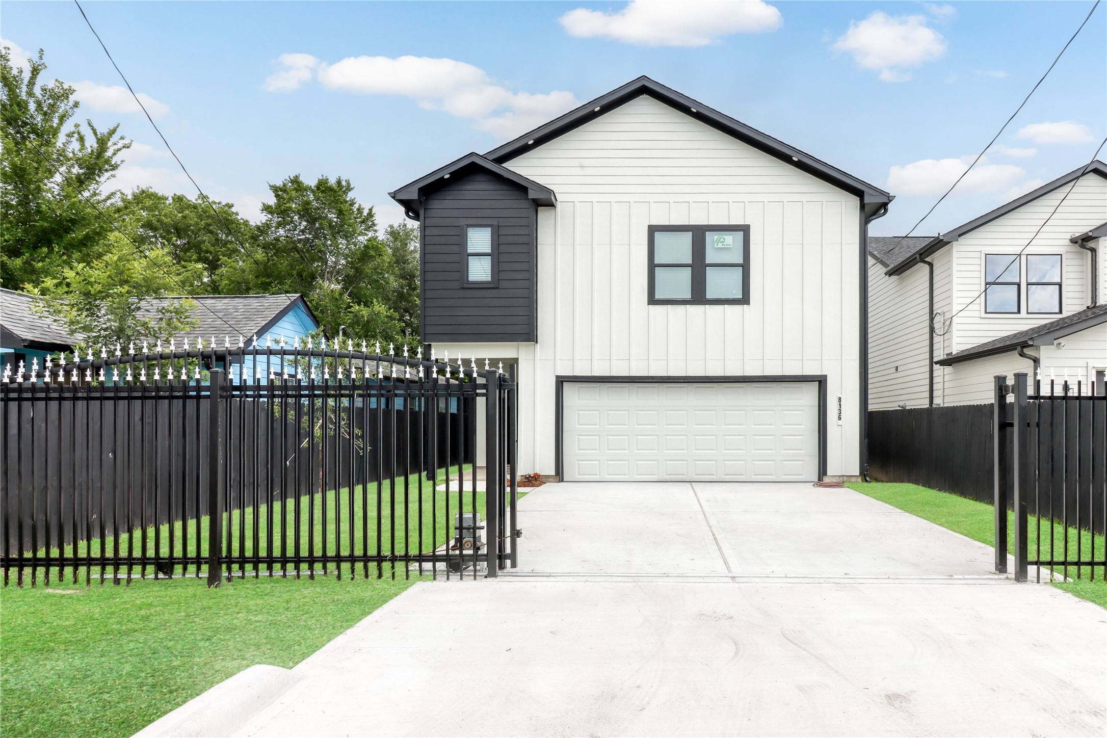 8136 Chateau Street Houston, TX 77028 - Photo 2 of 33 a view of a house with a small yard and wooden fence