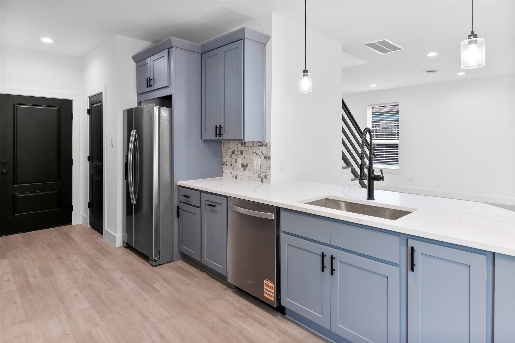 8136 Chateau Street Houston, TX 77028 - Photo 6 of 33 a bathroom with a double vanity sink and mirror