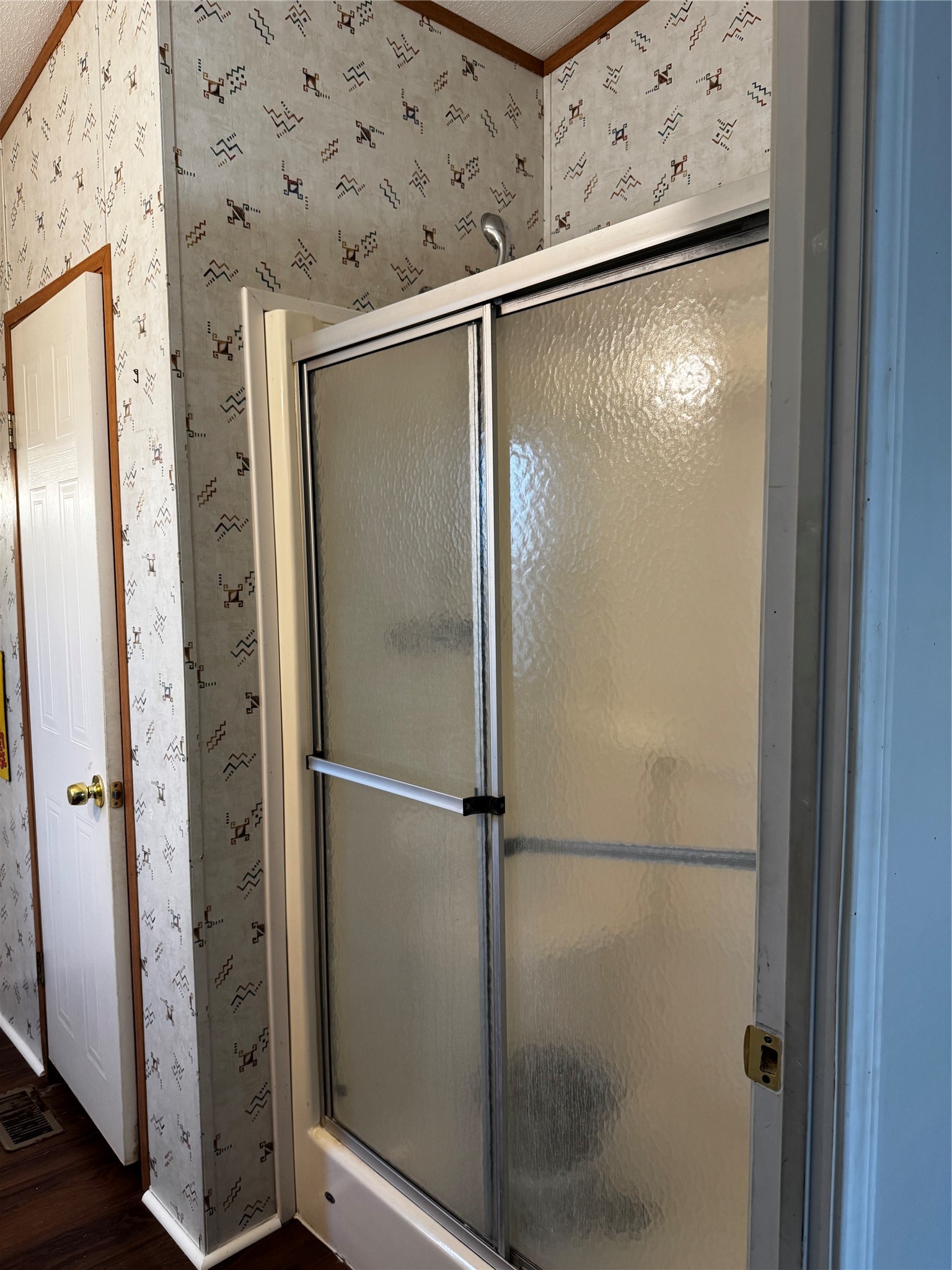 15930 Boss Gaston Road Sugar Land, TX 77498 - Photo 17 of 20 a bathroom with a glass shower door