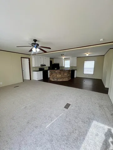 a view of a livingroom with furniture