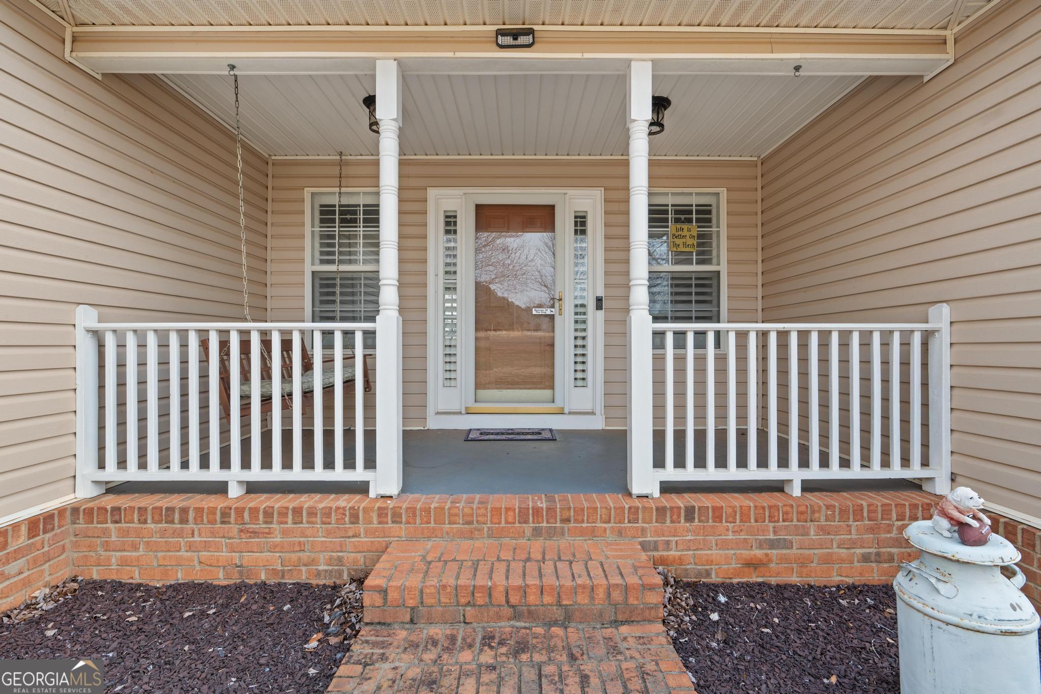 407 Trestle Road Locust Grove, GA 30248 - Photo 23 of 24 front porch