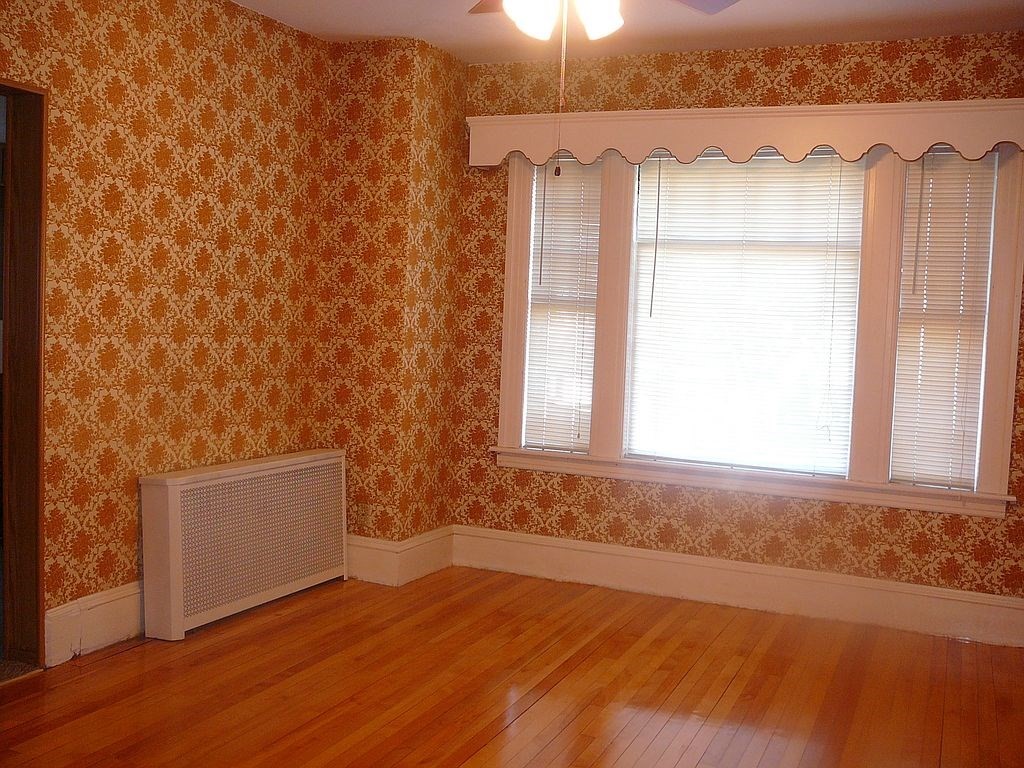 4 Guild Road Worcester, MA 01602 - Photo 18 of 30 view of empty room with a window and wooden floor