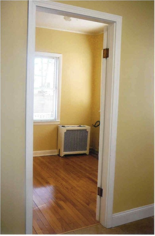 4 Guild Road Worcester, MA 01602 - Photo 19 of 30 a view of a small space with wooden floor and a window