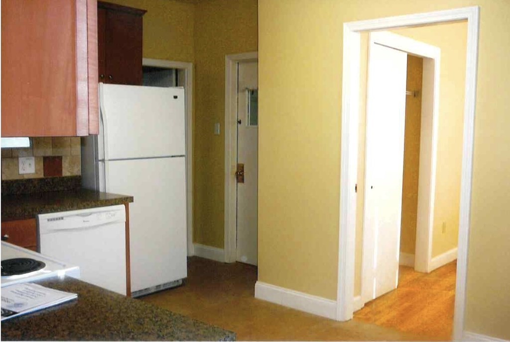 4 Guild Road Worcester, MA 01602 - Photo 28 of 30 a view of a refrigerator in kitchen and a window
