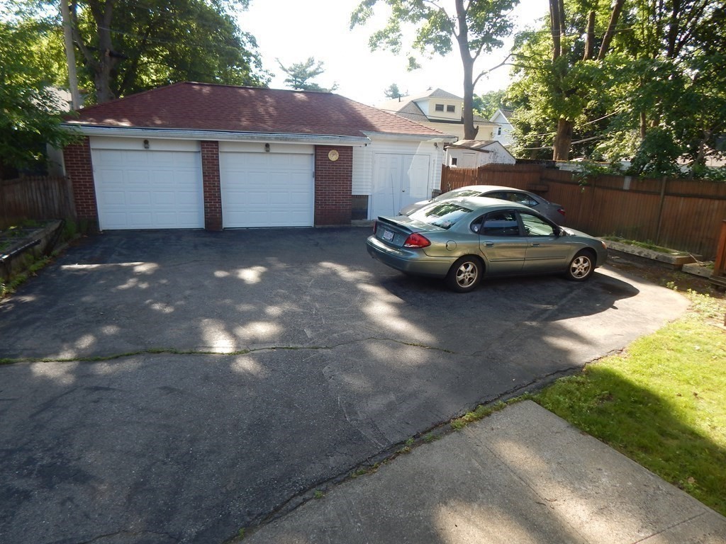 4 Guild Road Worcester, MA 01602 - Photo 6 of 30 a car parked in front of a house