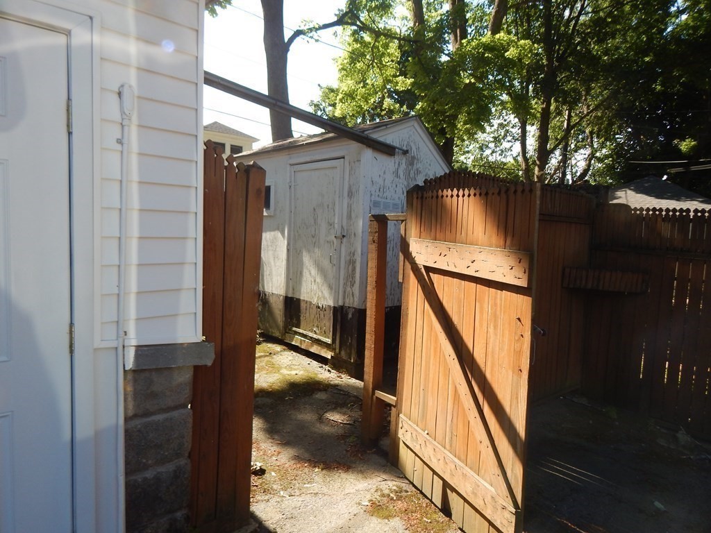 4 Guild Road Worcester, MA 01602 - Photo 9 of 30 a yellow house with outdoor space