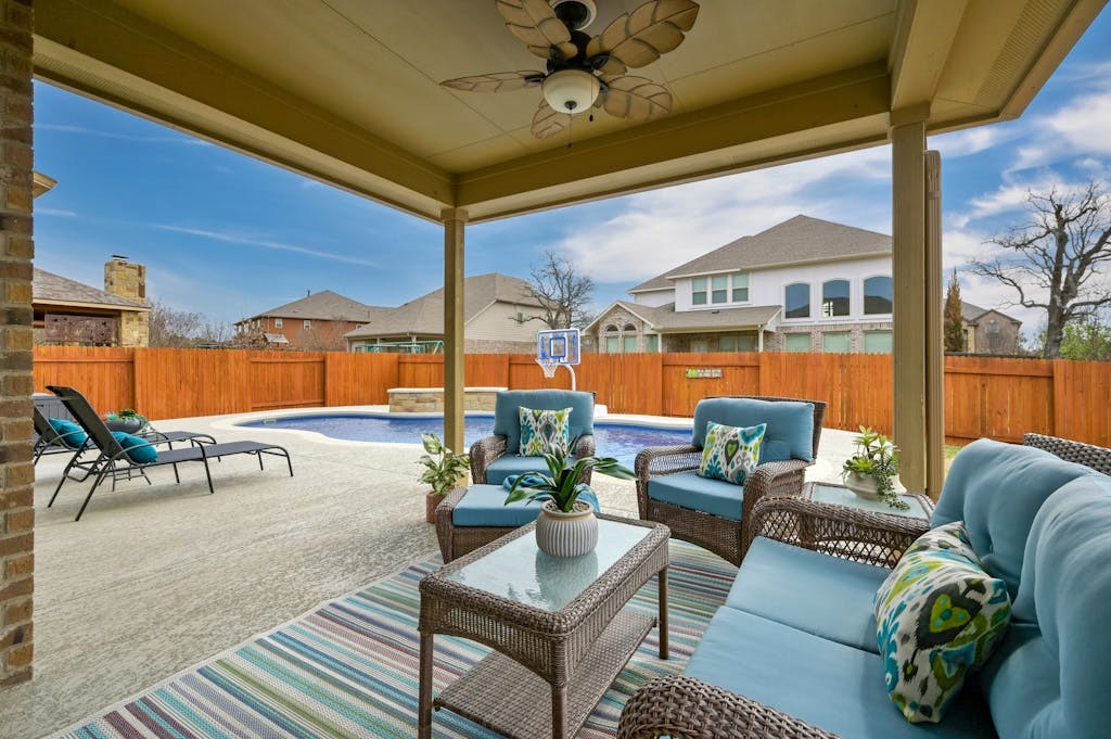Shady Covered patio is great for outdoor fun out of the sun