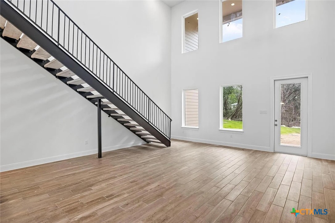 155 North Rip Ford Road, Unit B Spring Branch, TX 78070 - Photo 9 of 17 a view of an entryway with wooden floor