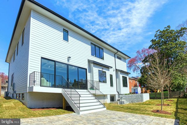 a view of a house with a swimming pool