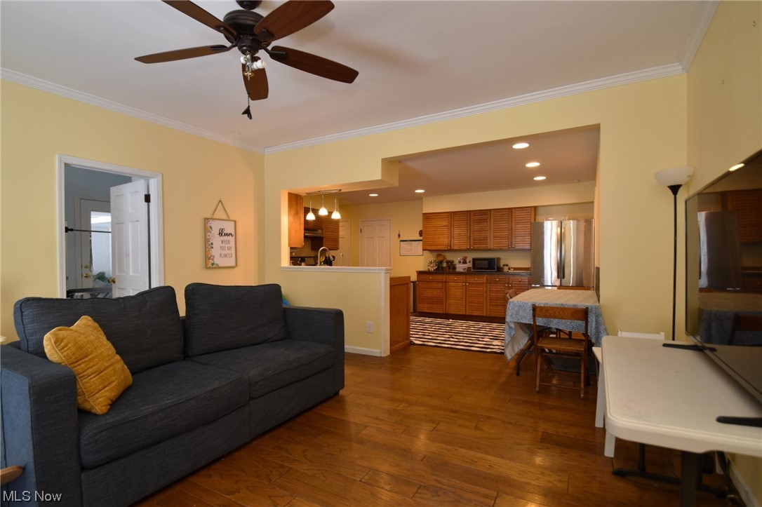 11801 Heath Road Chesterland, OH 44026 - Photo 5 of 21 Living room with dark wood flooring, ceiling fan