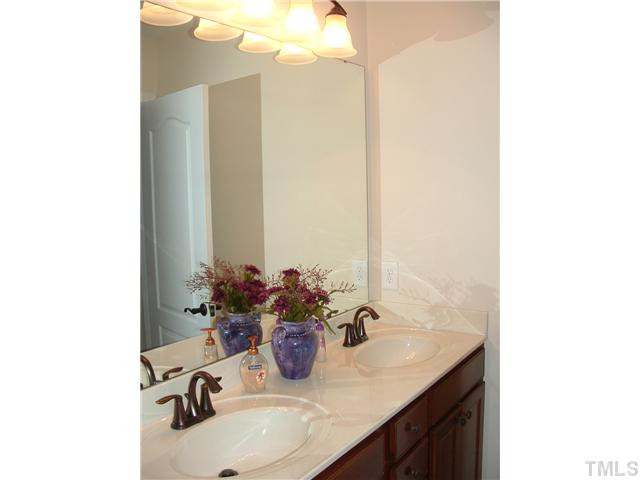 1908 Grace Point Road Morrisville, NC 27560 - Photo 17 of 22 Hall bath with dual sinks for the other bedrooms upstairs! Bathroom