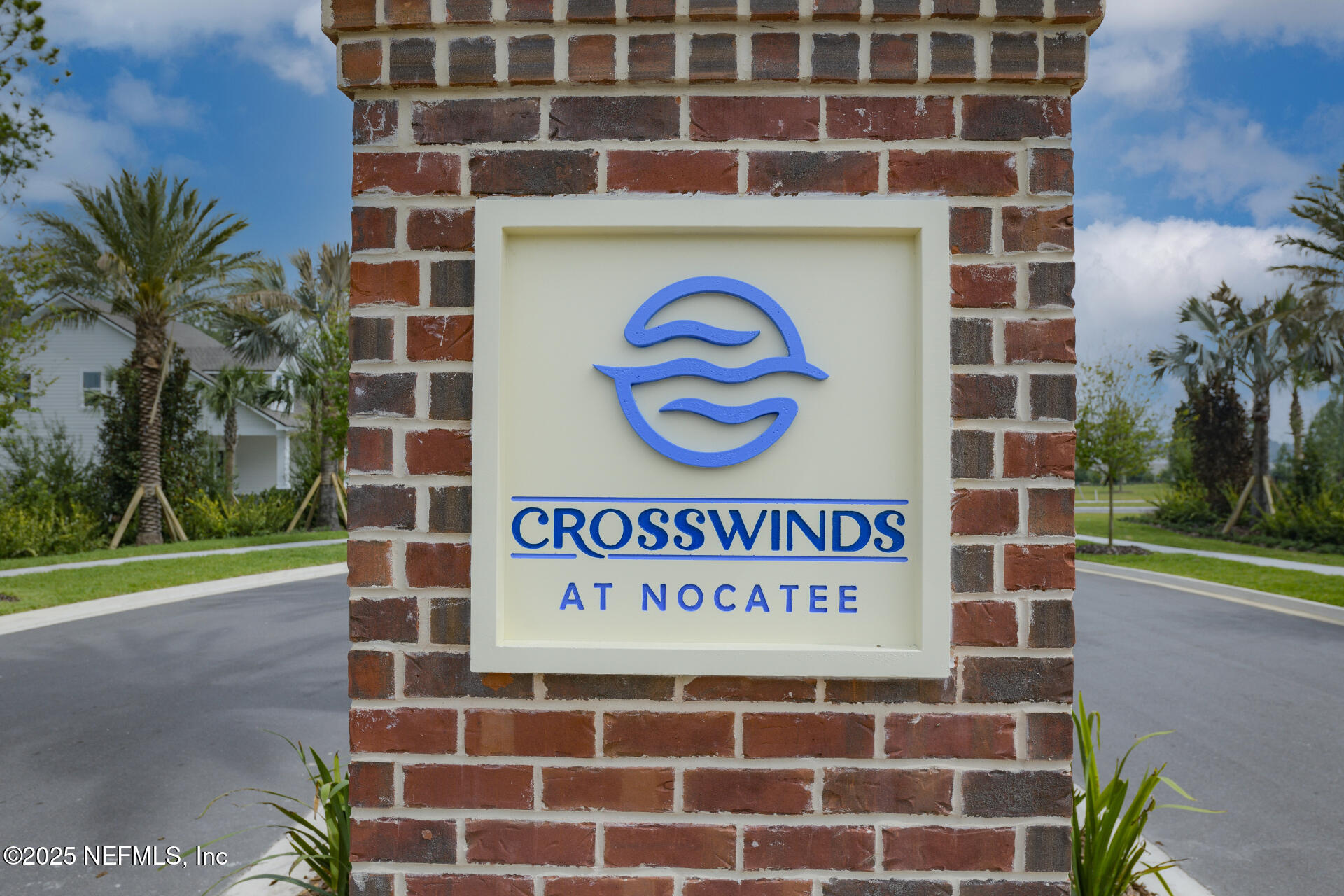 77 Aspendale Road Ponte Vedra, FL 32081 - Photo 11 of 13 a sign that is on a brick wall