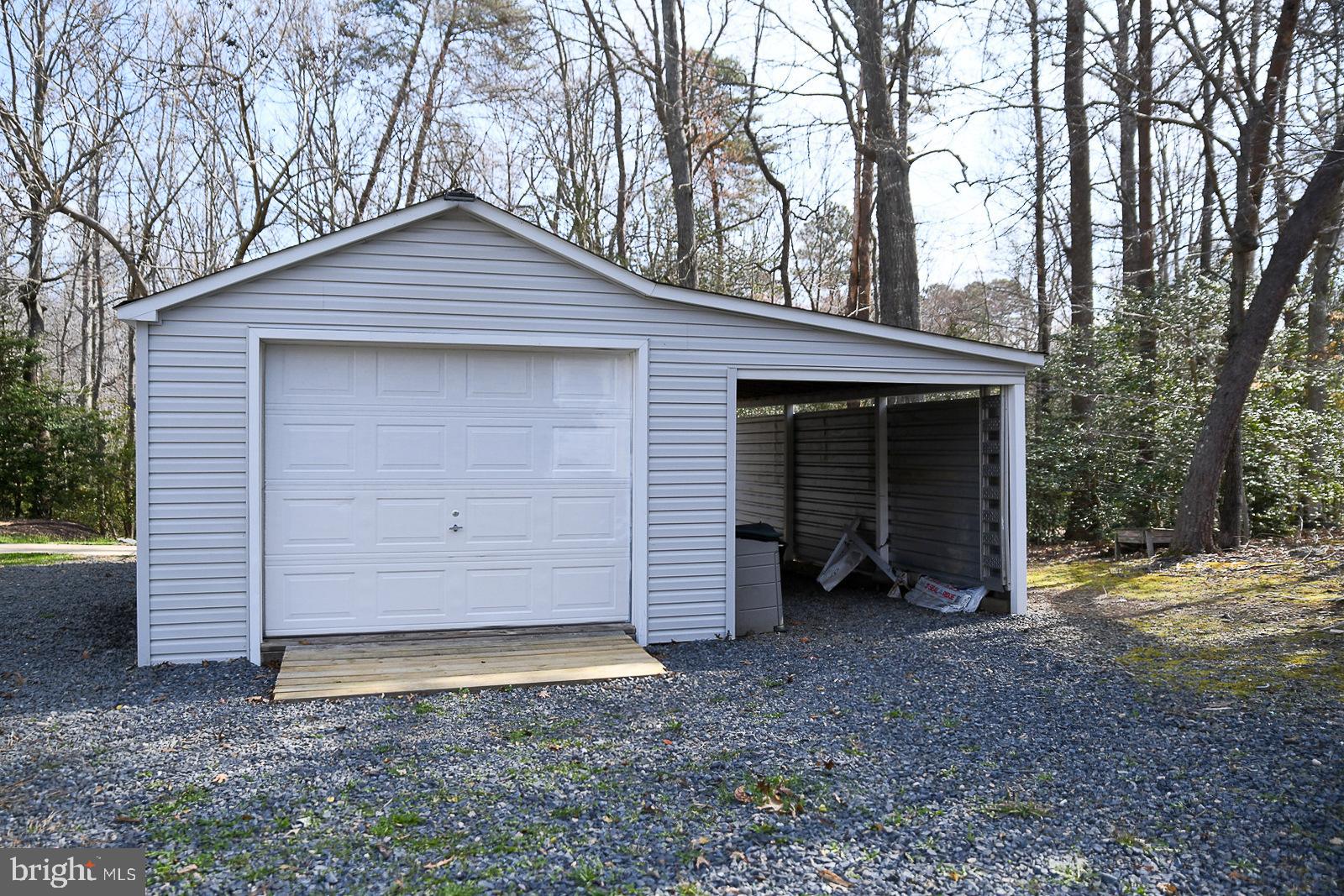 605 Planters Wharf Road Lusby, MD 20657 - Photo 29 of 45 a view of a house with a yard