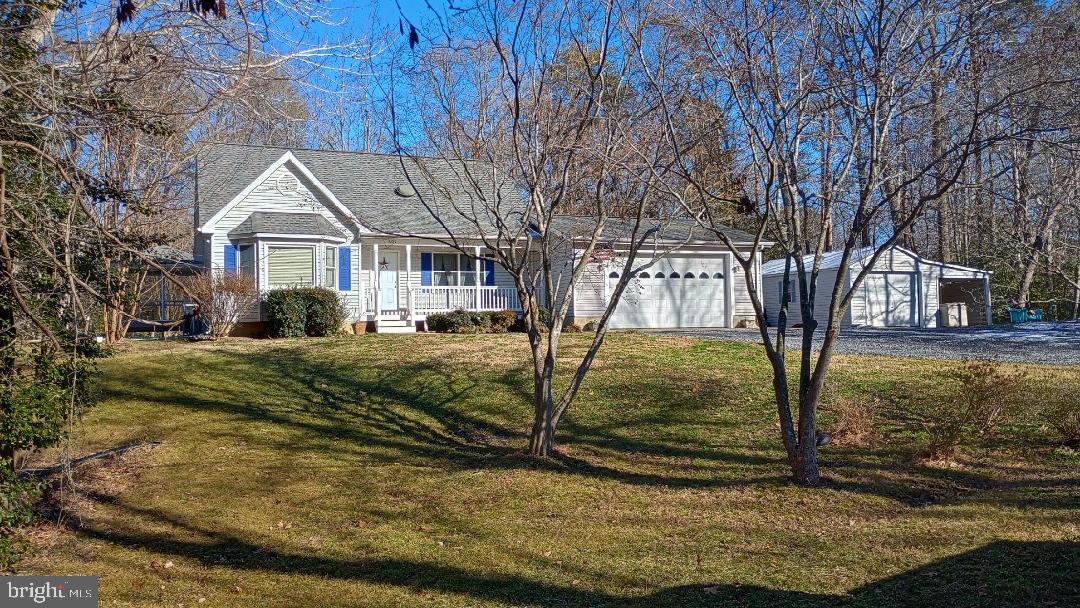 605 Planters Wharf Road Lusby, MD 20657 - Photo 32 of 45 a view of a house with a yard