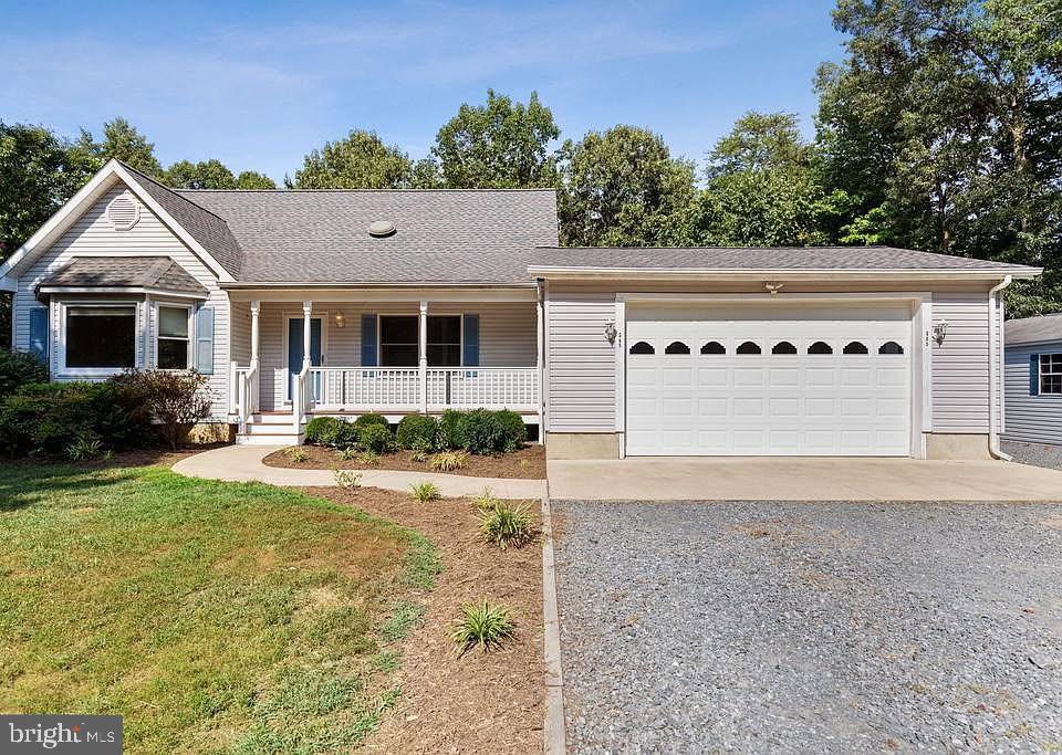 605 Planters Wharf Road Lusby, MD 20657 - Photo 38 of 45 a house view with a garden space