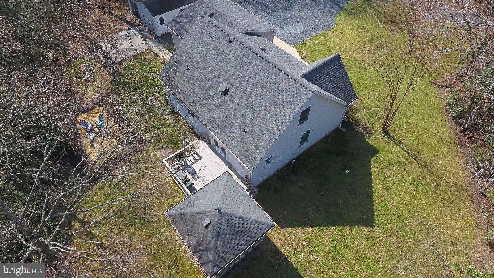 605 Planters Wharf Road Lusby, MD 20657 - Photo 39 of 45 view of a house with a backyard