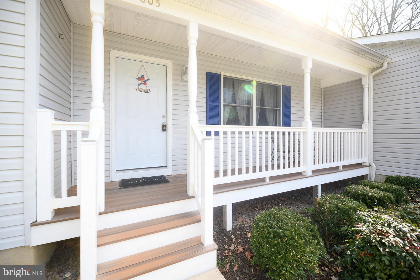 605 Planters Wharf Road Lusby, MD 20657 - Photo 41 of 45 a view of a house with a small yard