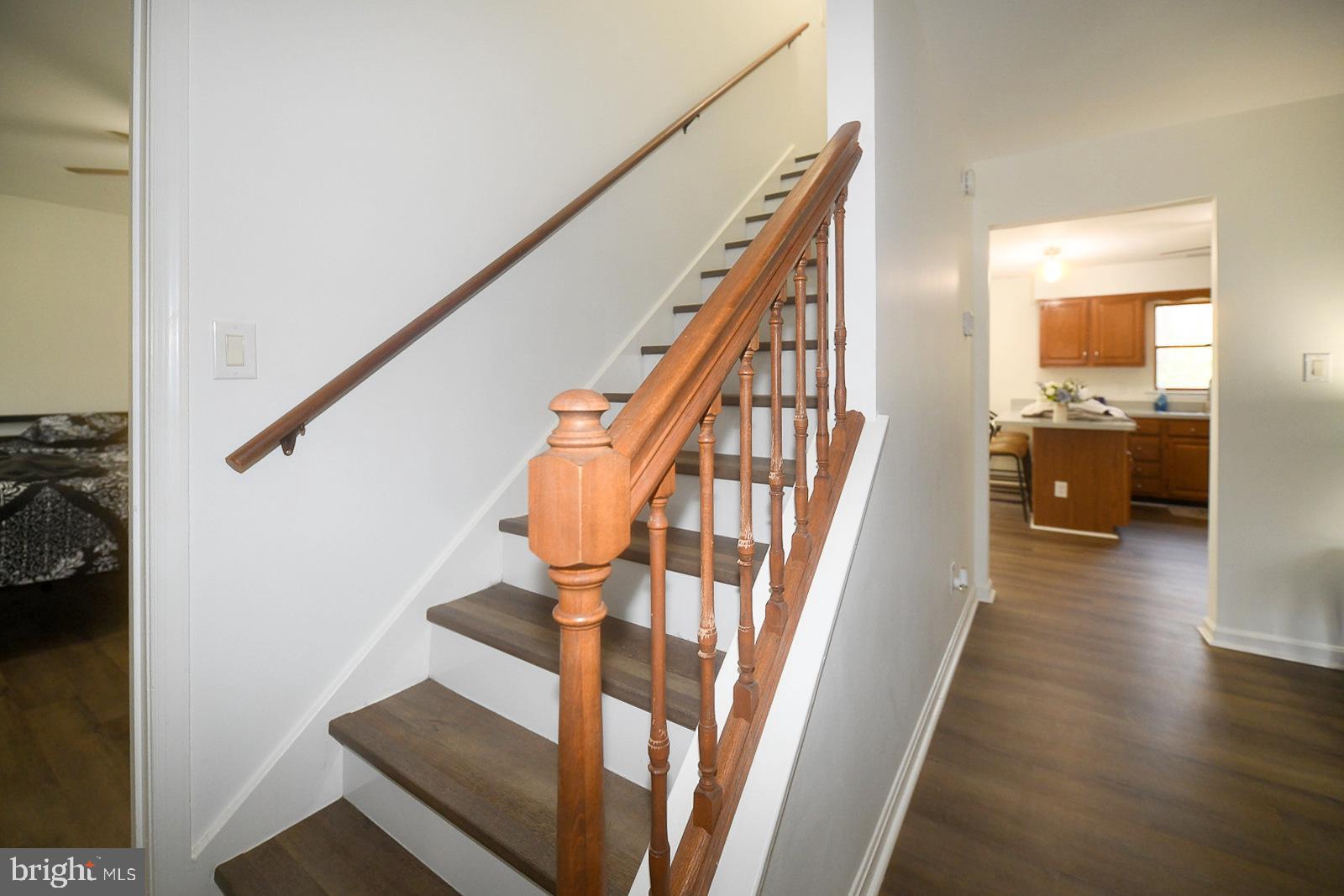 605 Planters Wharf Road Lusby, MD 20657 - Photo 43 of 45 a view of entryway and hall with wooden floor