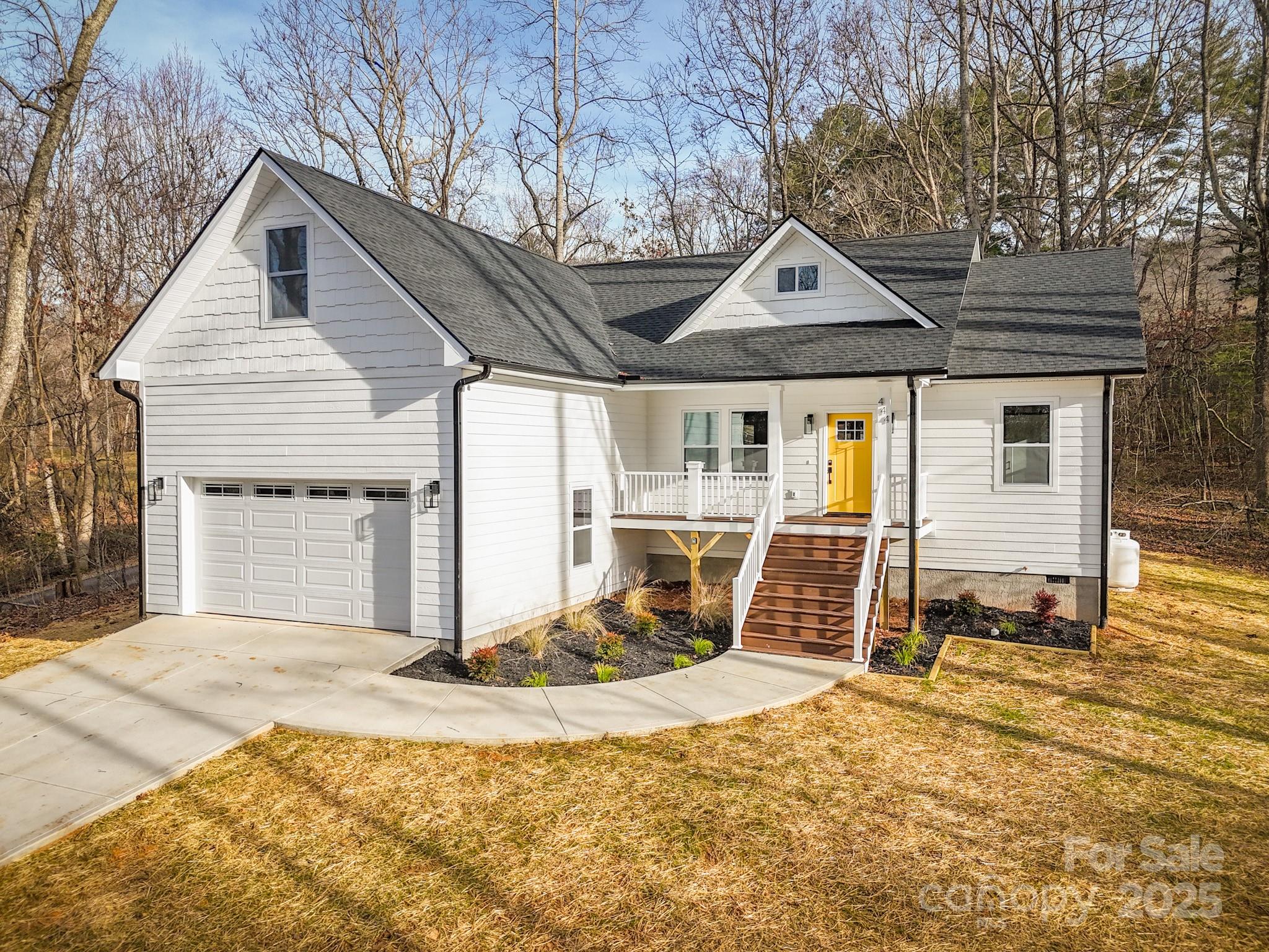 444 Old Buckeye Cove Road Swannanoa, NC 28778 - Photo 3 of 47 a view of a house with a backyard