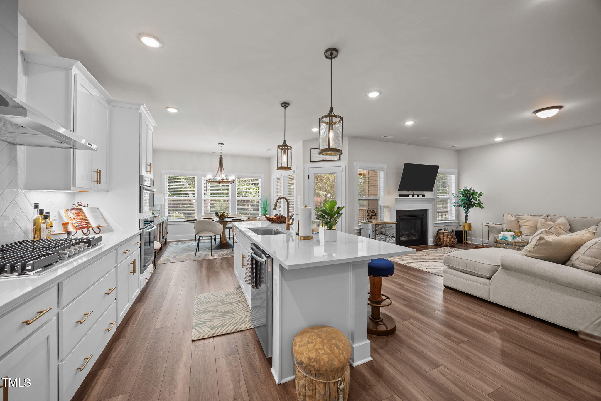 232 Duncan Crk Road Lillington, NC 27546 - Photo 12 of 33 a living room with fireplace furniture and a wooden floor