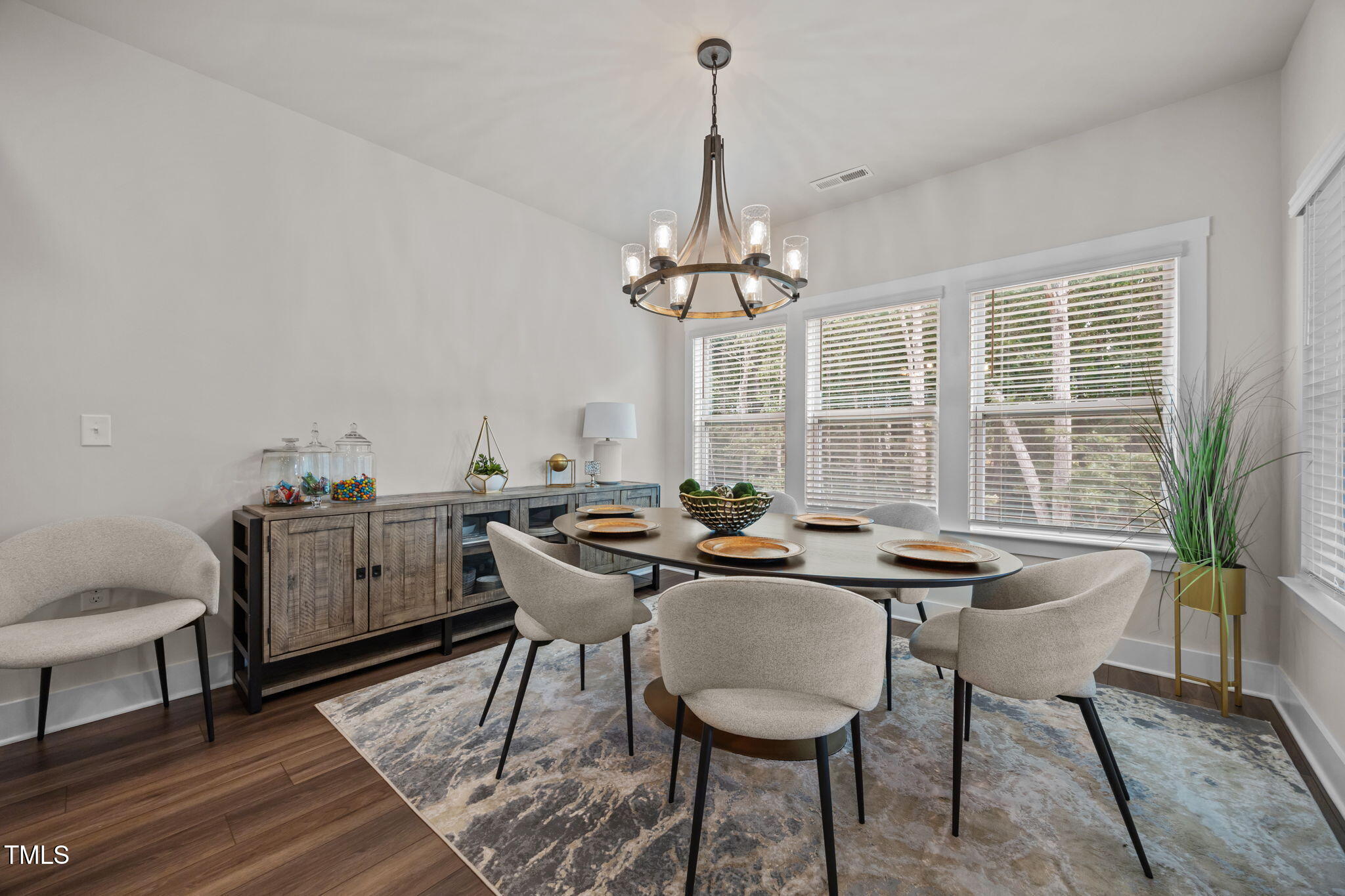 232 Duncan Crk Road Lillington, NC 27546 - Photo 15 of 33 a view of a dining room with furniture window and wooden floor