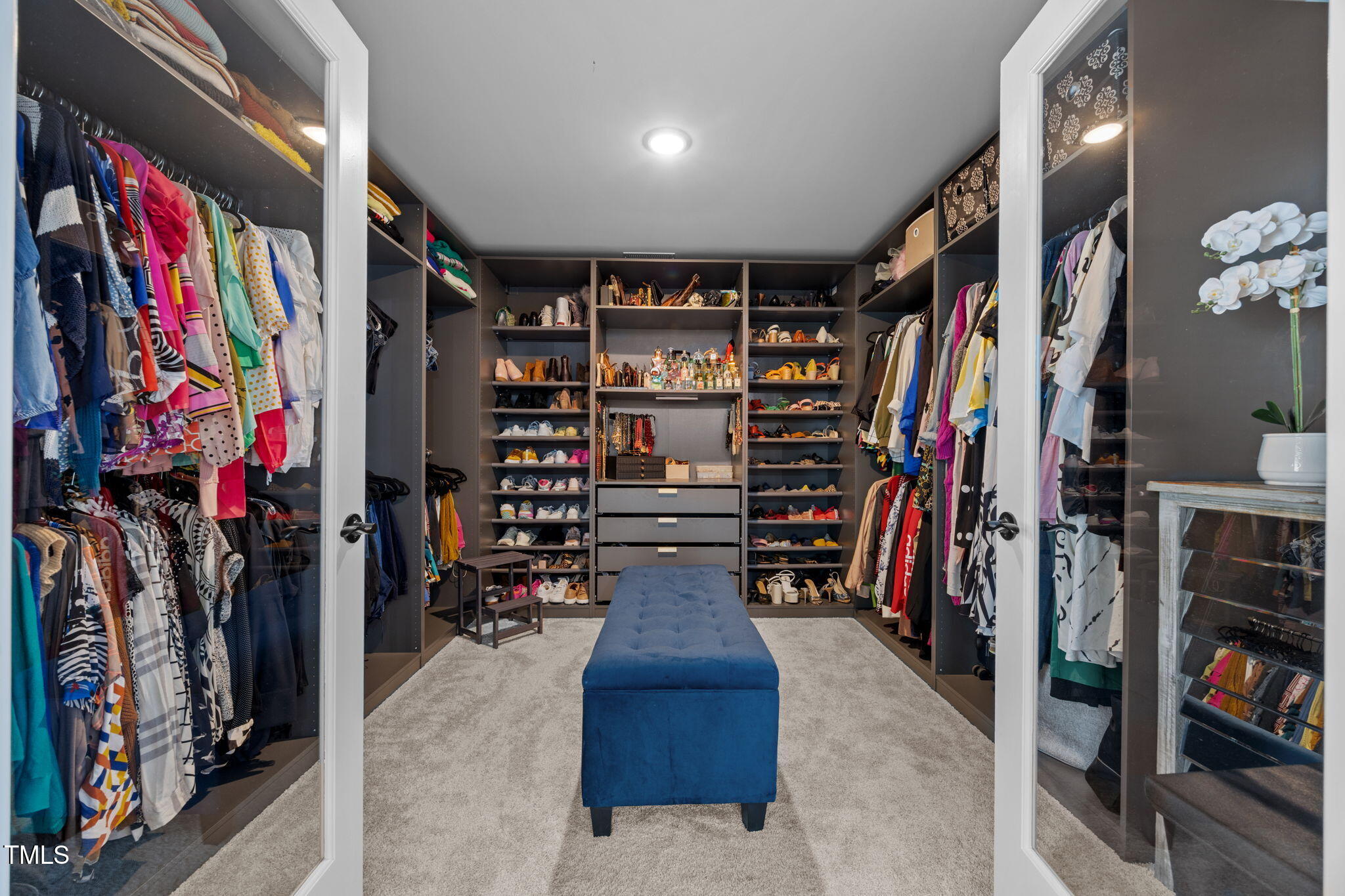 232 Duncan Crk Road Lillington, NC 27546 - Photo 19 of 33 a view of walk in closet with clothes and shoes