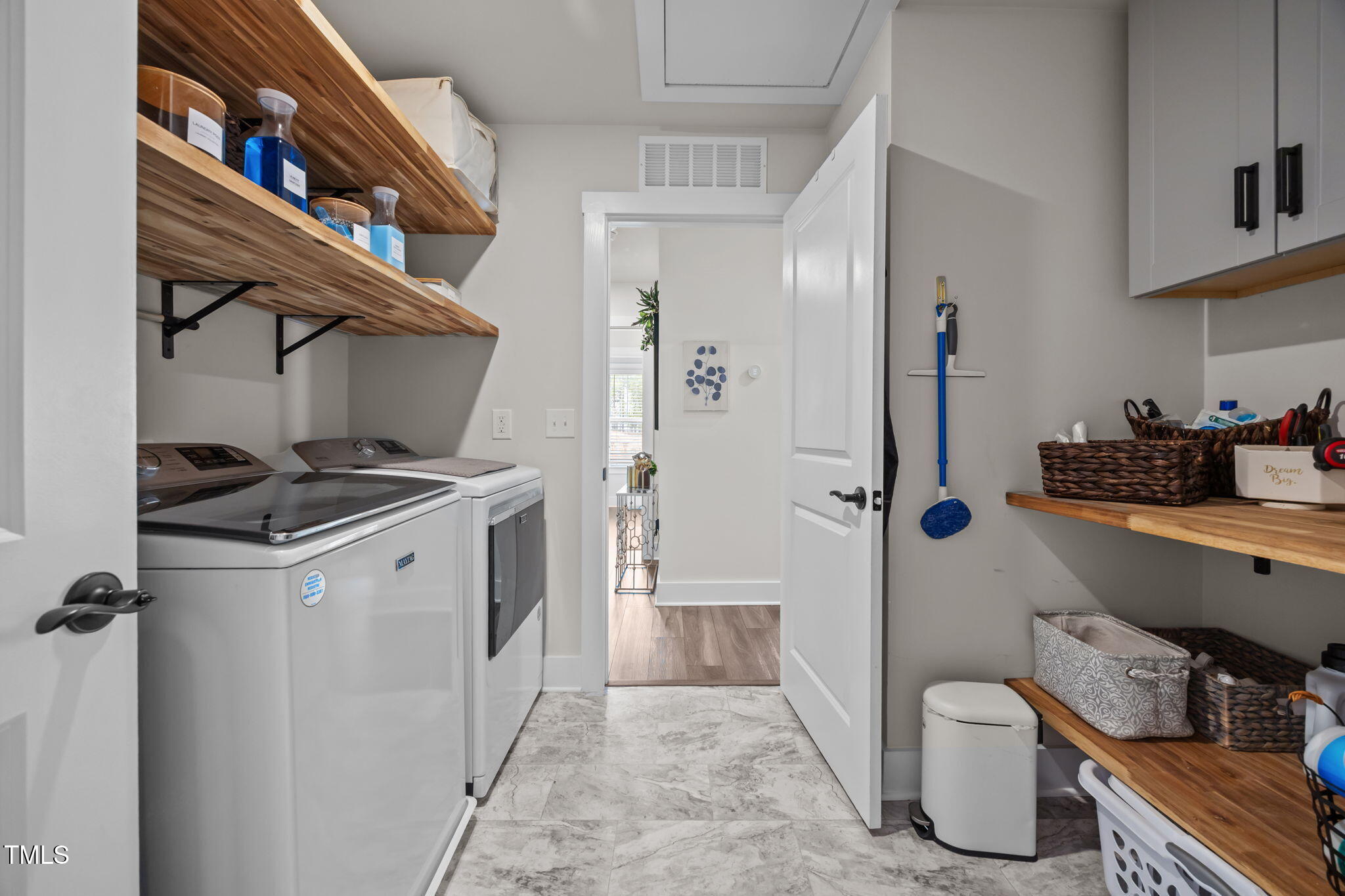 232 Duncan Crk Road Lillington, NC 27546 - Photo 29 of 33 a kitchen with a refrigerator and a stove