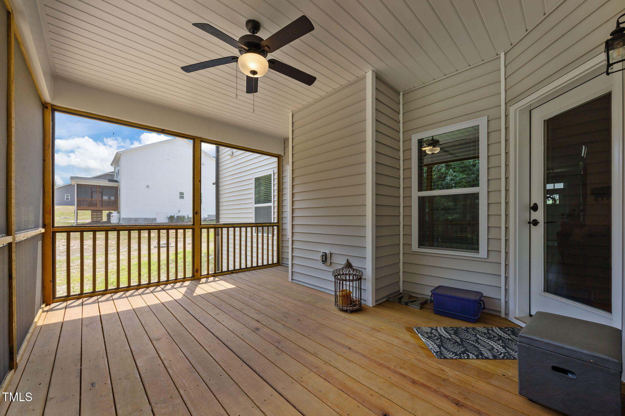 232 Duncan Crk Road Lillington, NC 27546 - Photo 30 of 33 a view of a porch with wooden floor