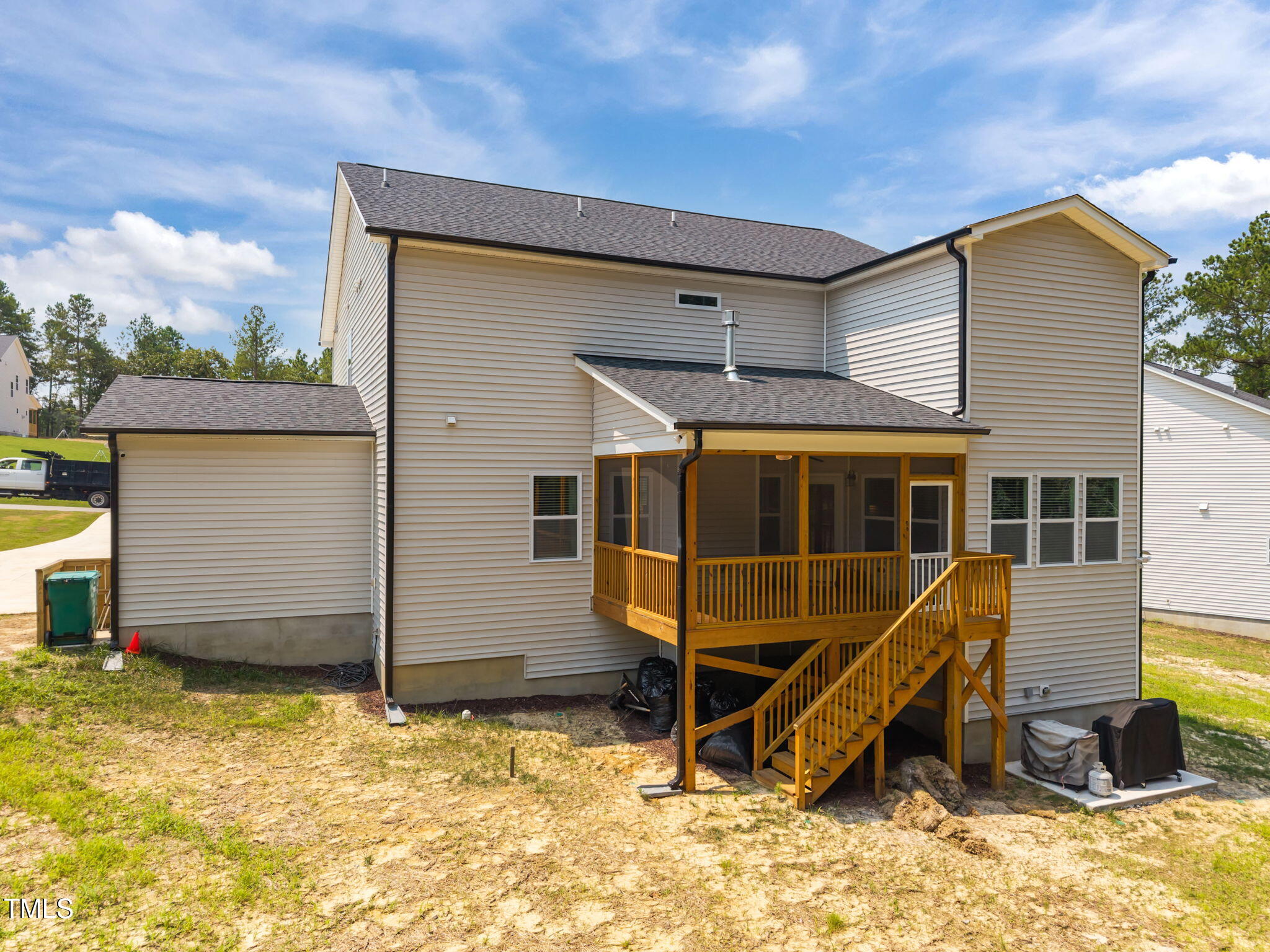 232 Duncan Crk Road Lillington, NC 27546 - Photo 32 of 33 a view of a house with a backyard