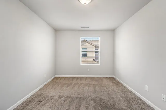 a view of a livingroom with an empty space