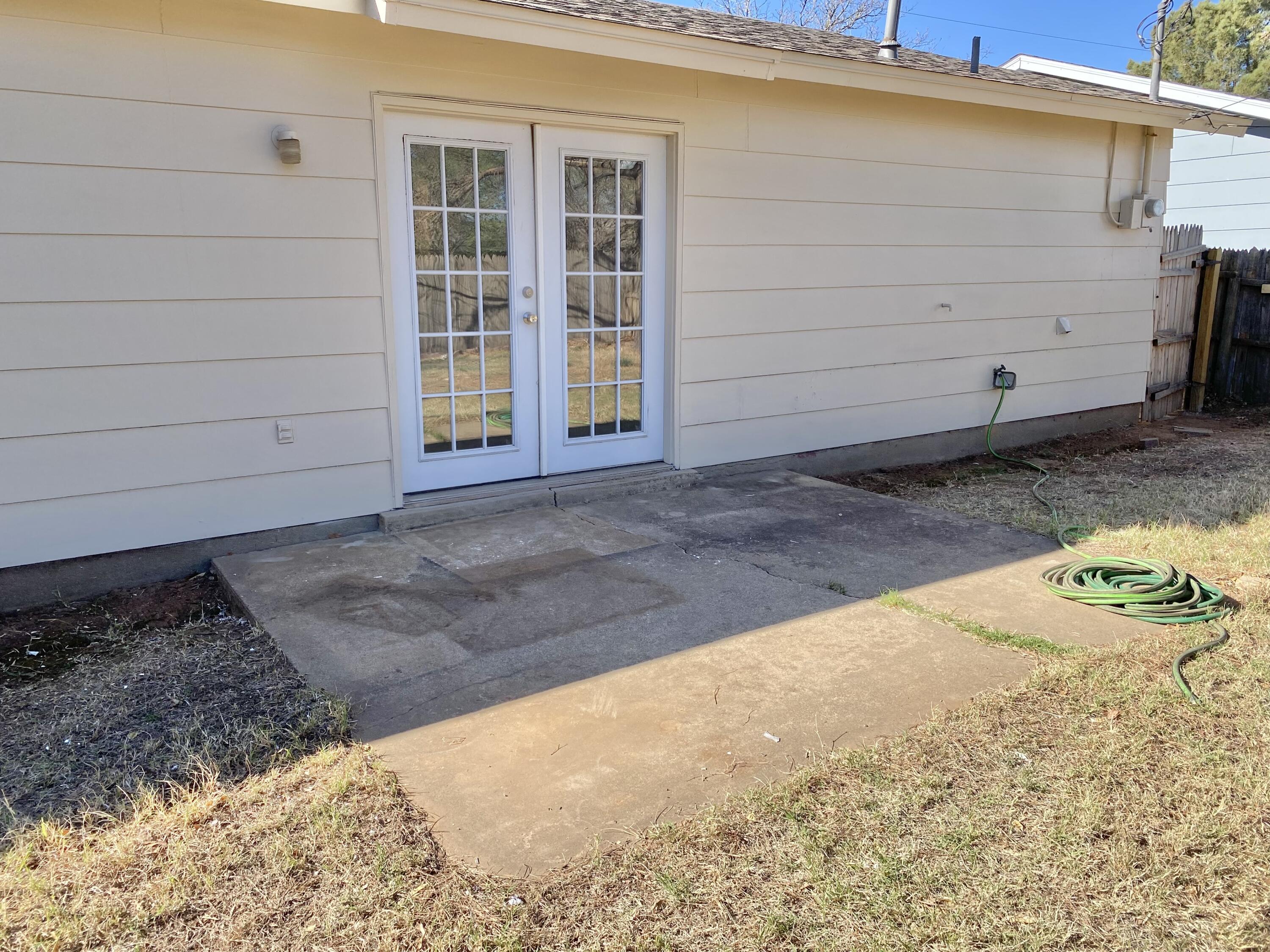 2128 74th Street Lubbock, TX 79423 - Photo 15 of 15 a view of a backyard of the house