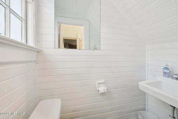 a bathroom with a sink and bathtub
