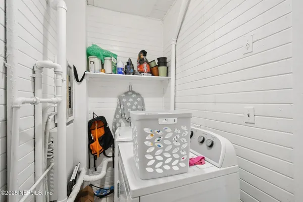 a room with storage and utility room