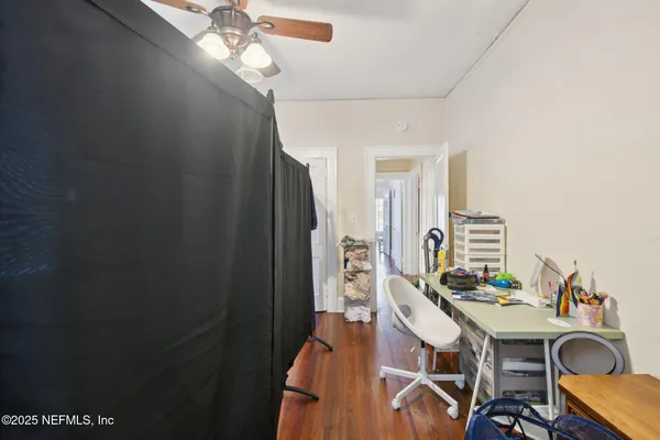 a view of a workspace with furniture