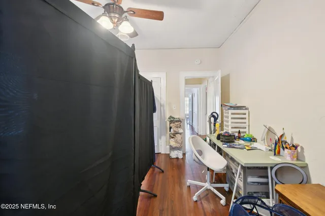 a view of a workspace with furniture