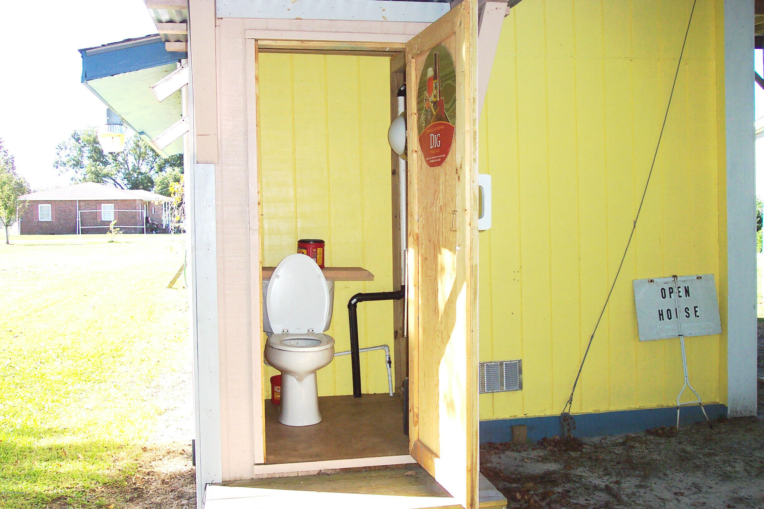 111 Piver Road Beaufort, NC 28516 - Photo 21 of 22 111 Piver Toilet next to Party House
