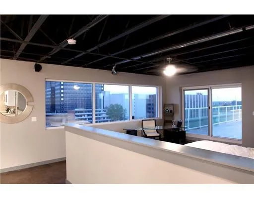 a view of a livingroom with furniture