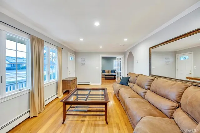 a living room with furniture and a table