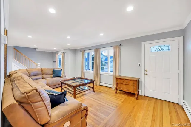 a living room with furniture and a table