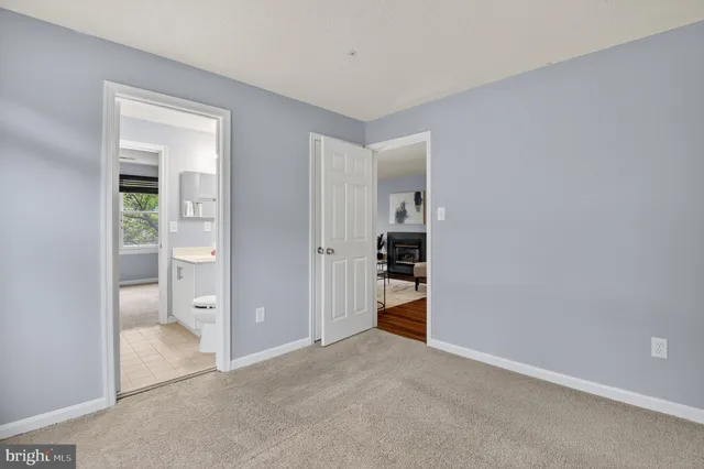 a view of living room and wooden floor