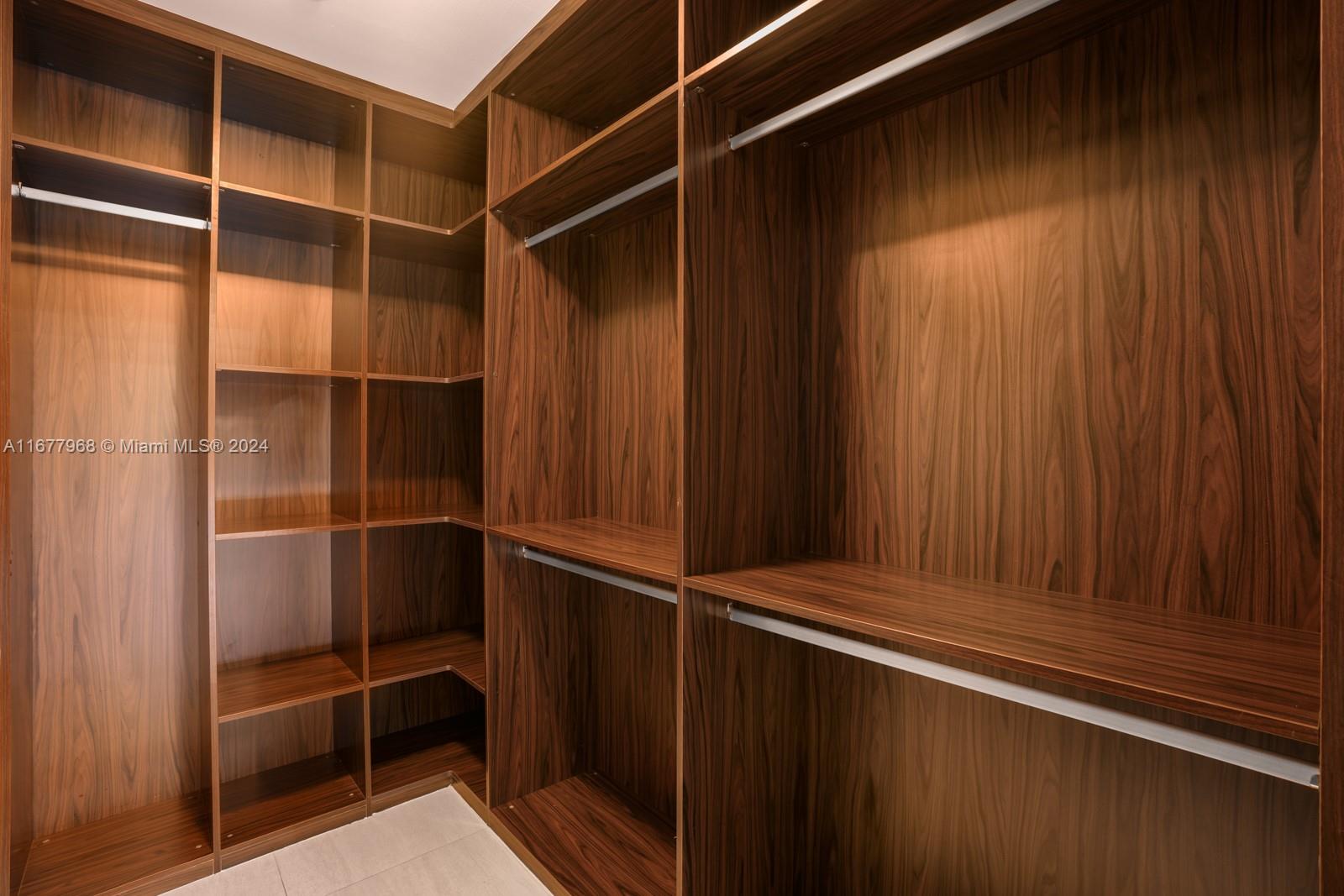9705 Collins Avenue, Unit 501N Bal Harbour, FL 33154 - Photo 21 of 30 a view of room with walk in closet
