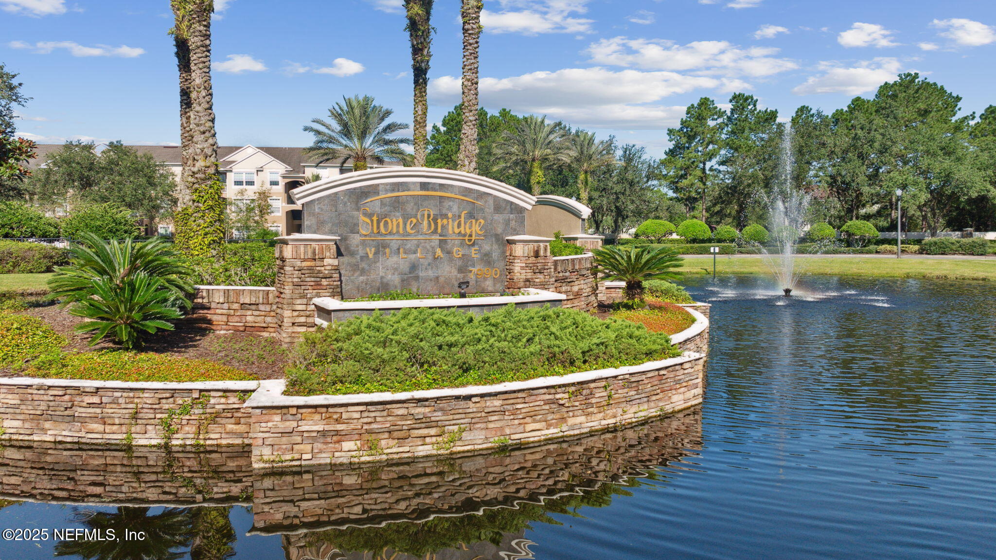 7990 Baymeadows Road East, Unit 2202 Jacksonville, FL 32256 - Photo 1 of 39 a view of a garden with a fountain