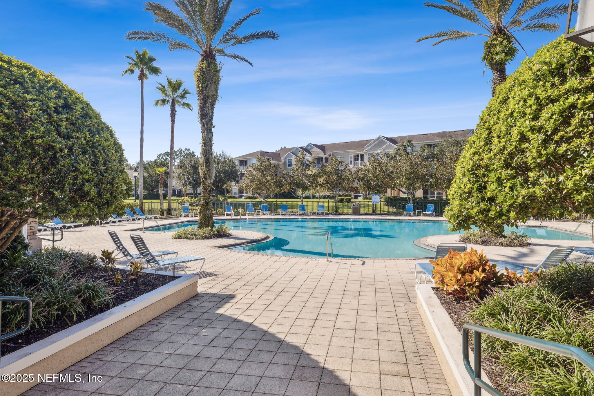 7990 Baymeadows Road East, Unit 2202 Jacksonville, FL 32256 - Photo 11 of 39 a view of swimming pool with a patio
