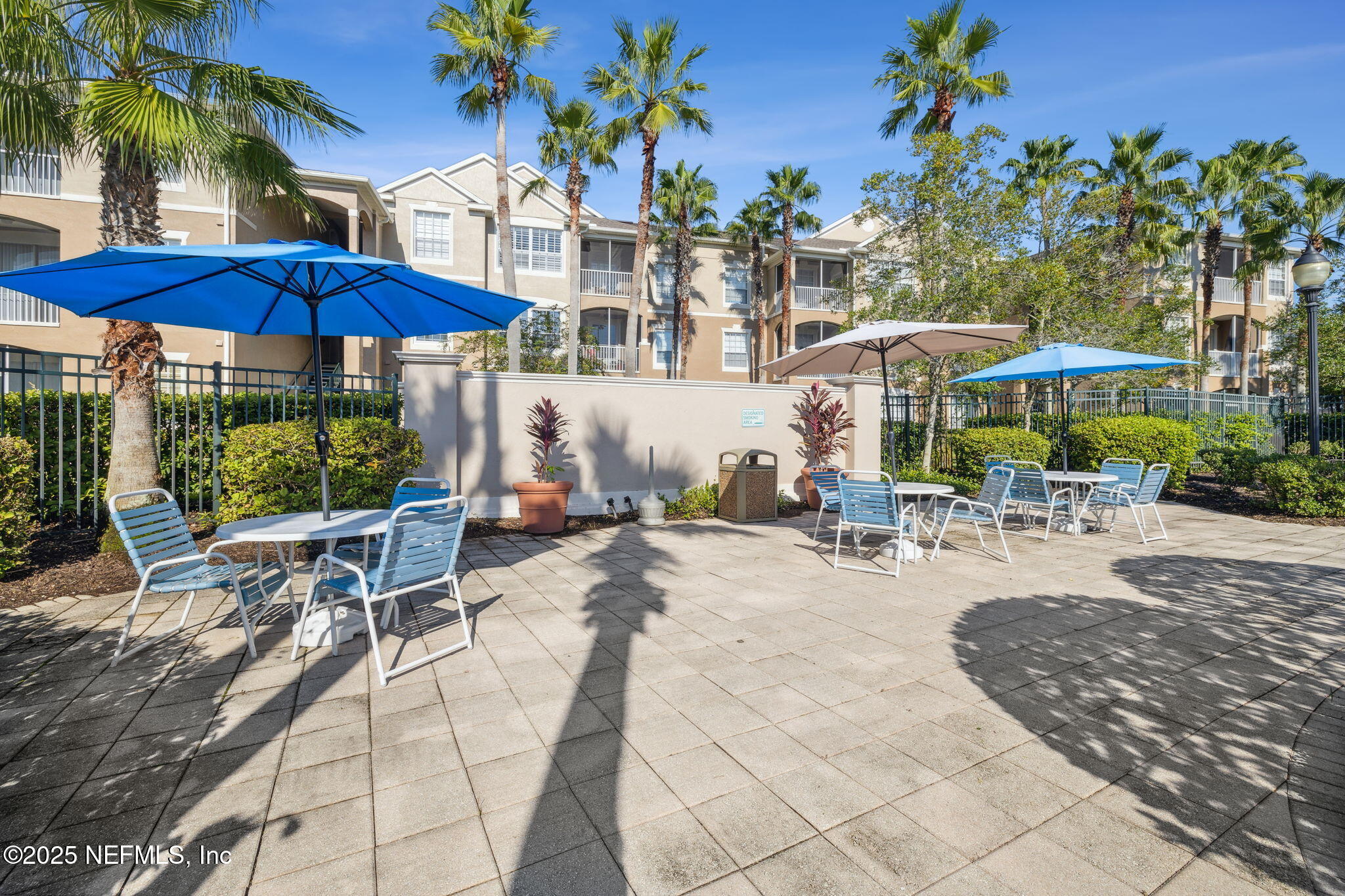7990 Baymeadows Road East, Unit 2202 Jacksonville, FL 32256 - Photo 13 of 39 a view of a swimming pool with a patio