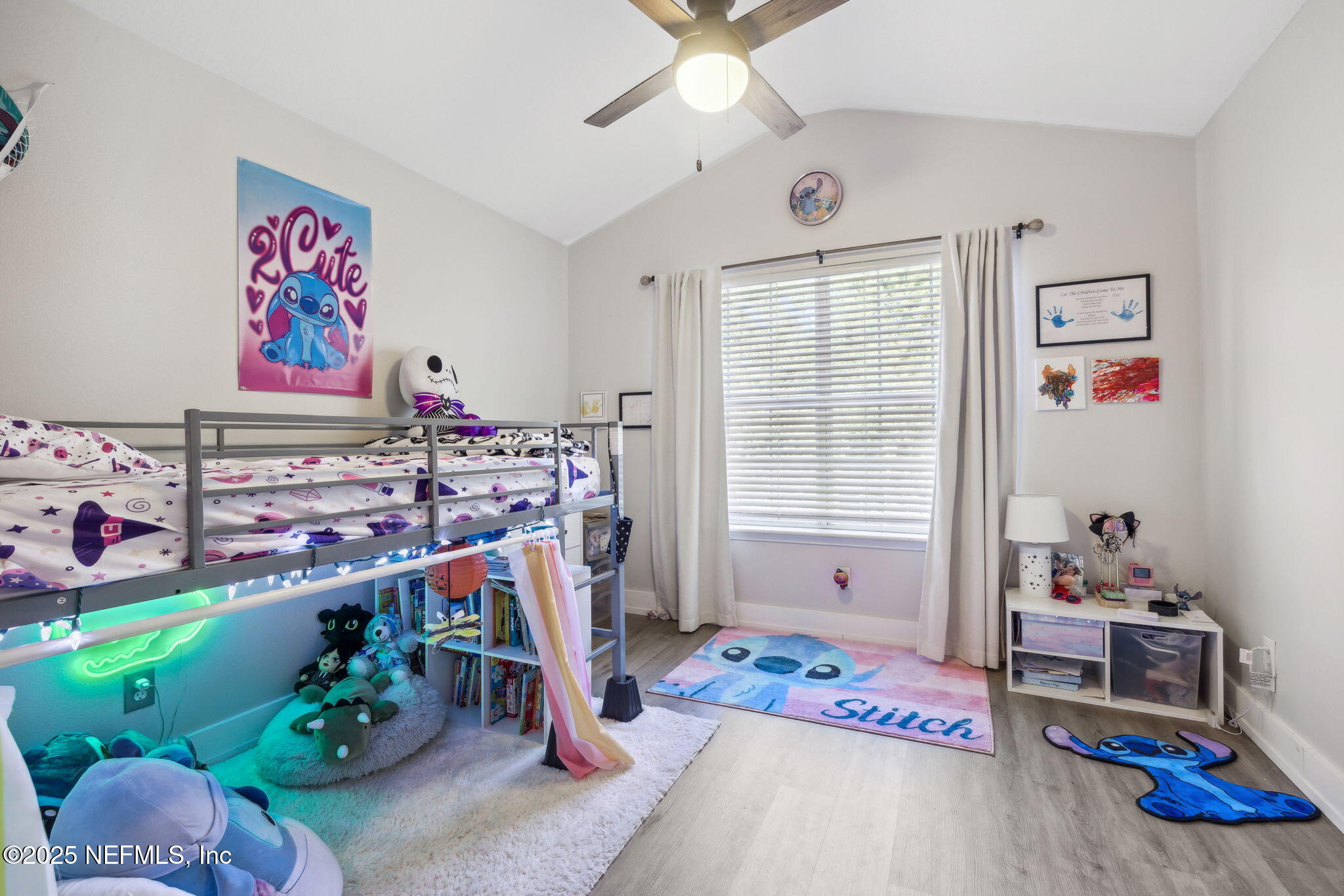 7990 Baymeadows Road East, Unit 2202 Jacksonville, FL 32256 - Photo 34 of 39 a bedroom with furniture and a fan