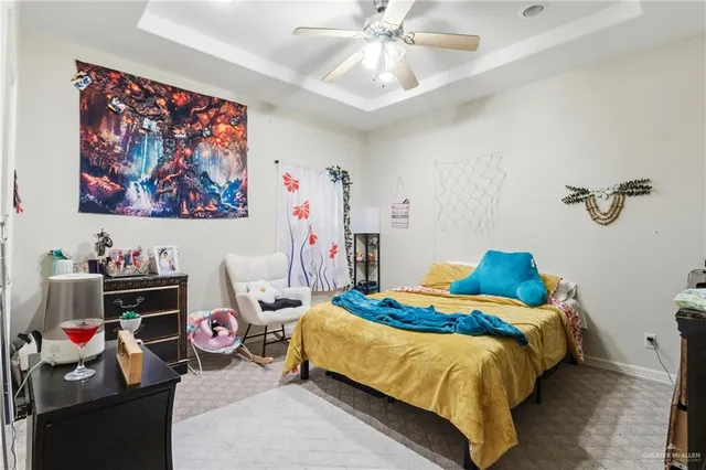 a bedroom with bed and furniture