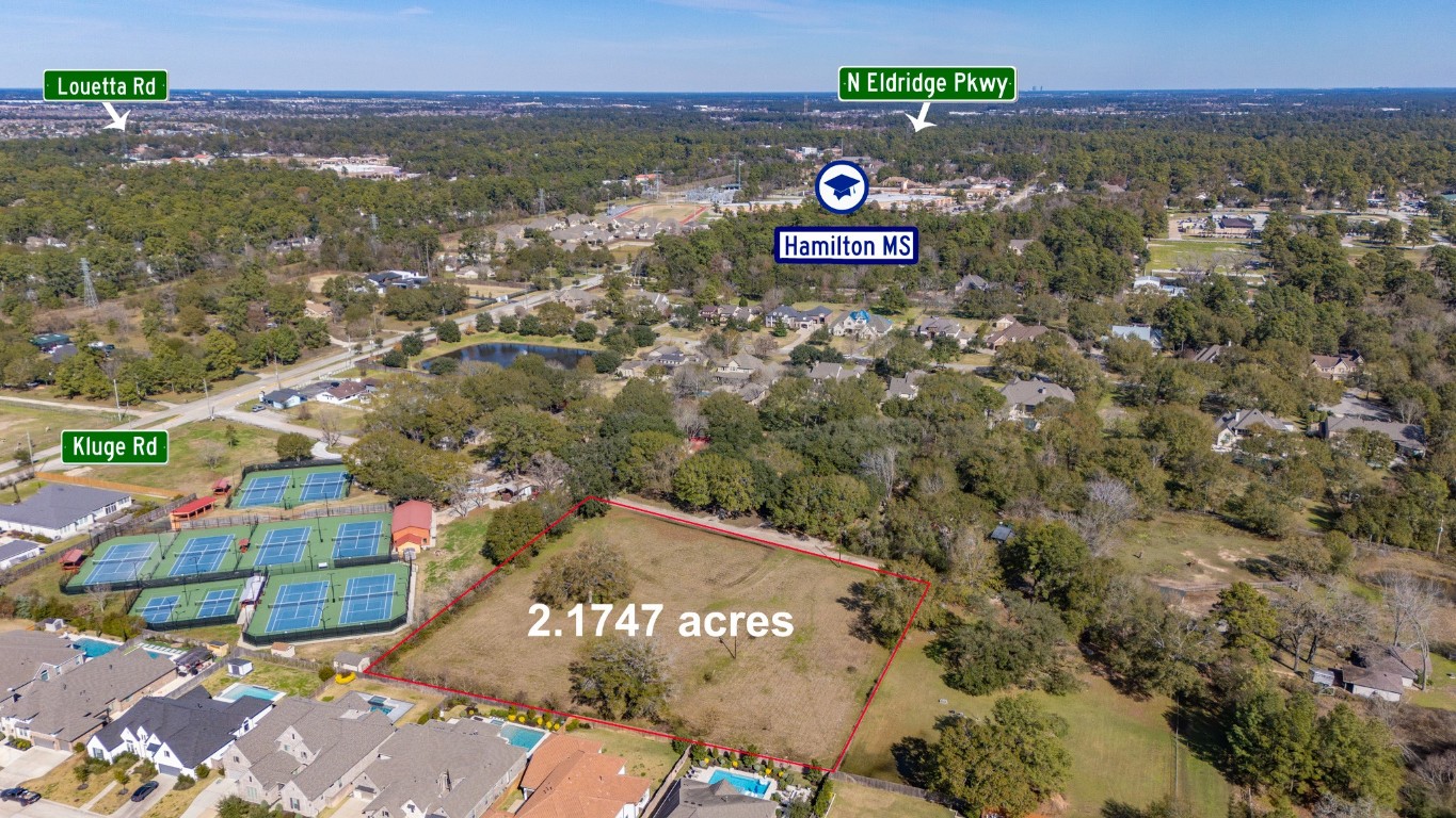 12537 Kluge Road Cypress, TX 77429 - Photo 11 of 12 a view of a city with an ocean view